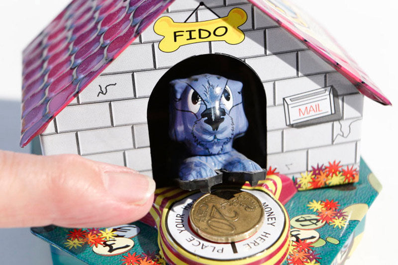 Tin toy piggy bank "Fido" with mechanism 