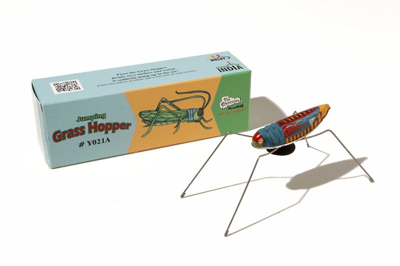 Tin toy Grashopper with bouncing mechanism