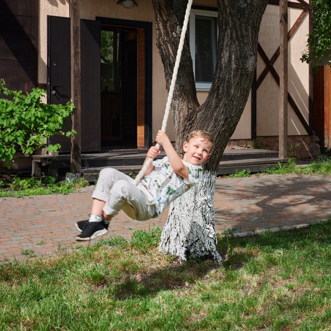 Wooden swing with rope for children