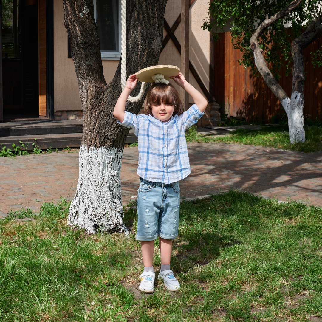 Wooden swing with rope for children